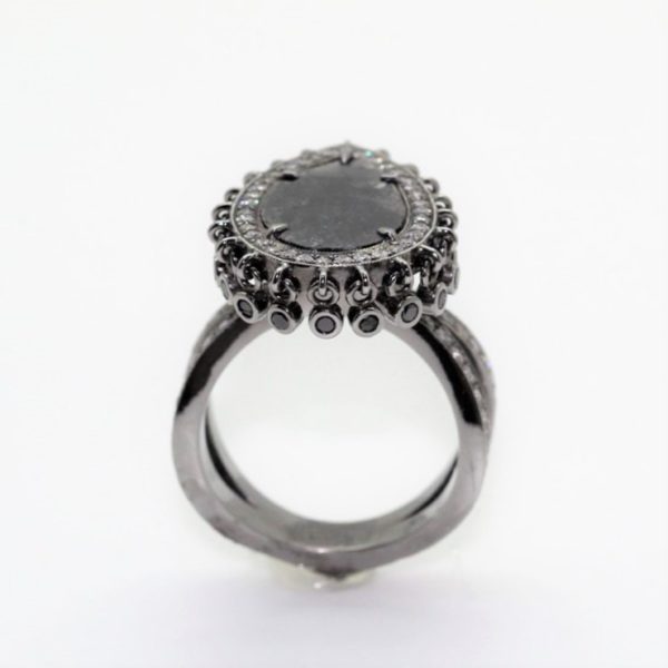 black diamond ring with halo of black and white diamonds