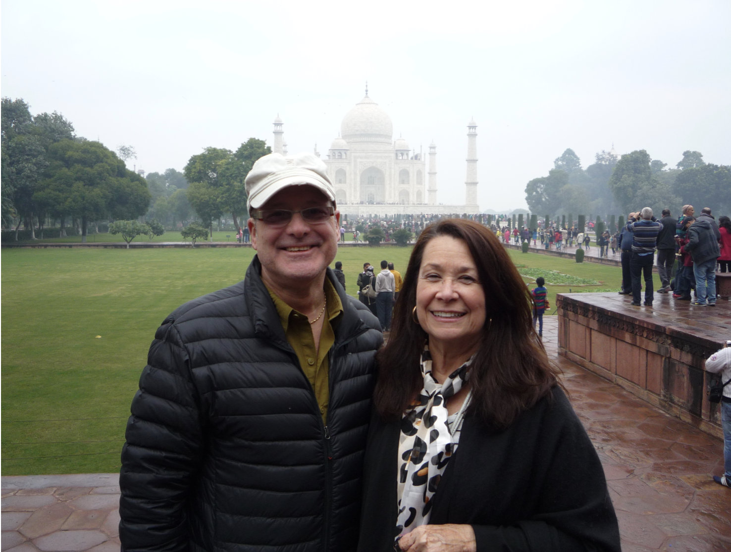 The owners of The Diamond Shop, Thom and Mona, standing in front of the Taj Mahal.